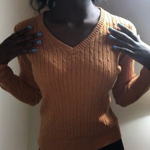 orange sweater